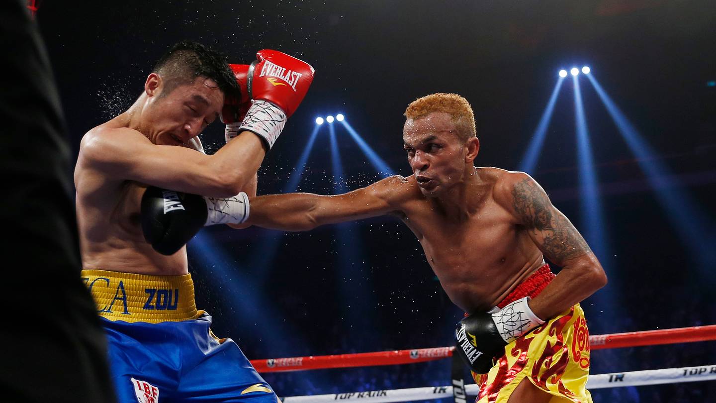 No headgear, new scoring, 3 pros headline Olympic boxing