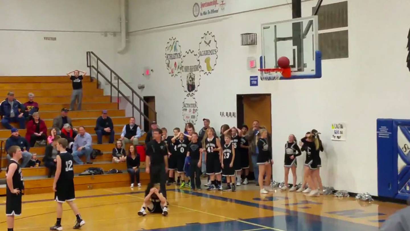 Team loses when game-winning attempt gets stuck on rim - Sports Illustrated