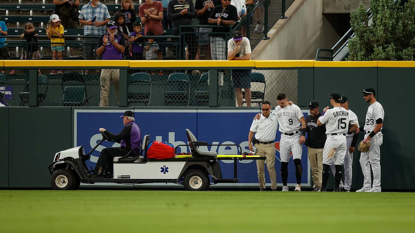 Rockies’ Brenton Doyle Carted Off With Injury After Crashing Into