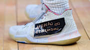 Kyrie Irving Sends Message With Shoes in Dallas Debut