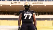 Five-star offensive lineman Jordan Seaton confirms he'll be signing with Deion Sanders and Colorado