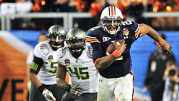 Newton fights his way to BCS title in strange and unexpected game