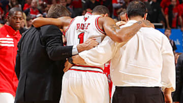 Rose's torn ACL mars Bulls' superb victory over 76ers in Game 1