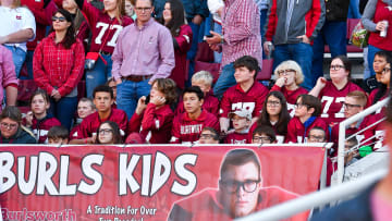 Burls Kids Cheer Hogs to Bowl-Qualifying Win