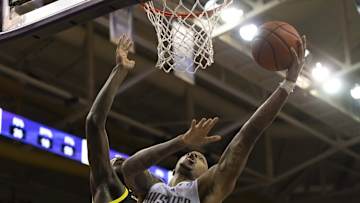 Huskies Overcome Early Swings and Misses to Land Knockout Punch