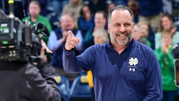 Notre Dame’s Mike Brey Celebrates Final Home Game at Local Bar
