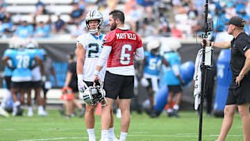 Mayfield Says McCaffrey Is ‘Keeping Us Guessing’ on His Injury Status