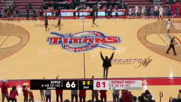 Lone Fan Storms Court After College Basketball Team's First Win of the Season