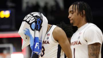 Fan Trolls Virginia Basketball With Perfect T-Shirt Reference to Iowa Football at March Madness Game