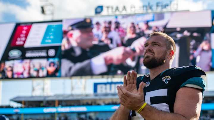 Jaguars' long snapper Matt Overton reacts to the retirement of former teammate Andrew Luck