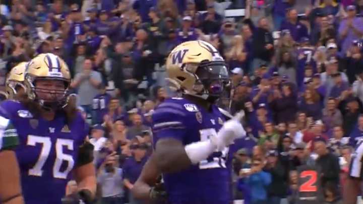 The Huskies Roll Over The Rainbow Warriors 52-20
