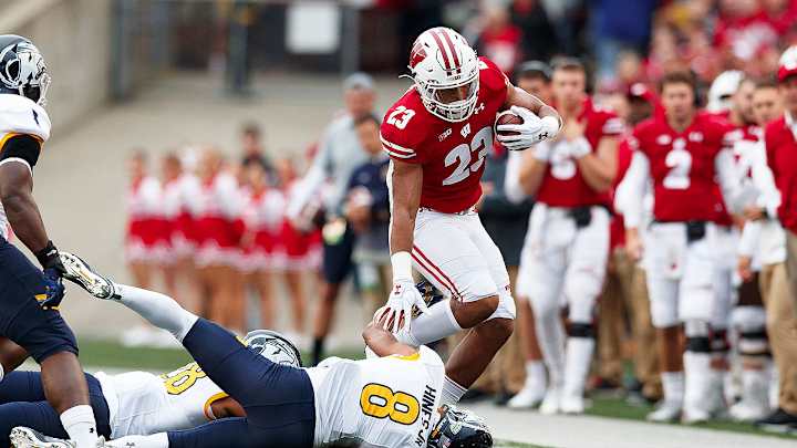 Jonathan Taylor Scores Five TDs as Wisconsin Routs Kent State