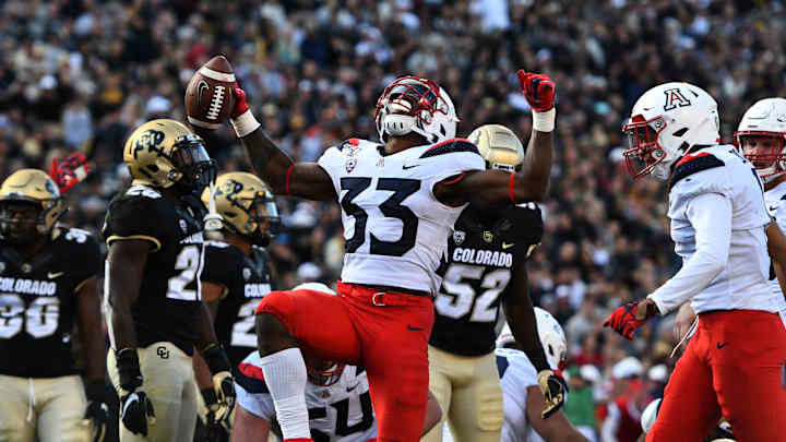 Khalil Tate amazes, Wildcats defeat Buffaloes 35-30