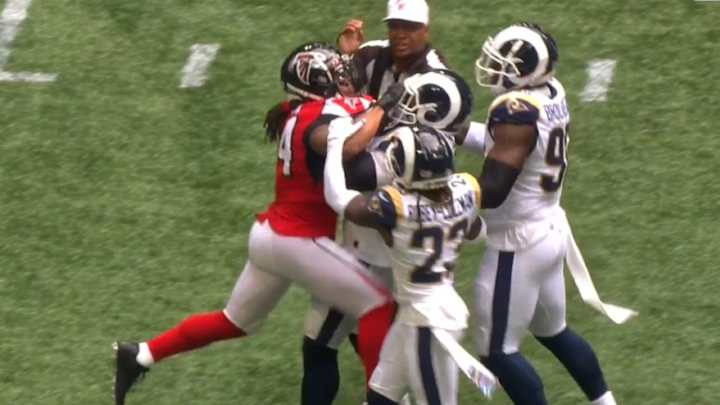 Devonta Freeman Ejected For Punching Aaron Donald in Rams, Falcons Brawl Devonta Freeman Ejected For Punching Aaron Donald in Rams, Falcons Brawl