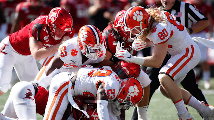 Clemson’s Booth Rides Managers’ Bus After Ejection Clemson’s Booth Rides Managers’ Bus After Ejection