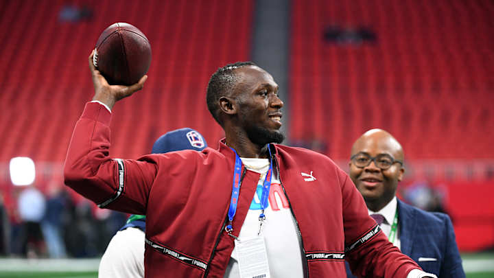 Usain Bolt Says He's Ready to Play in NFL 'If Patriots or Aaron Rodgers Call Me'