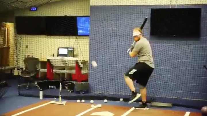 Watch: Justin Turner Somehow Manages to Hit a Baseball Blindfolded