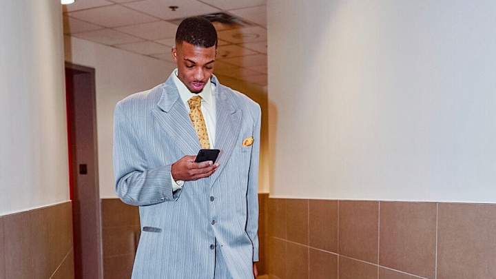 Friday’s Hot Clicks: Delon Wright Wore a Suit Straight Out of the 2003 Draft