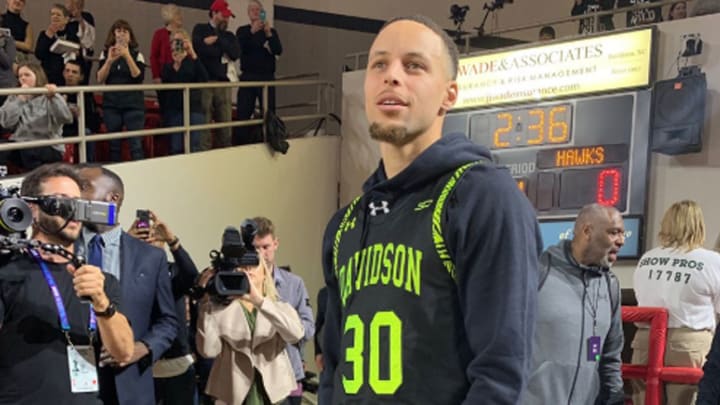 Watch: Steph Curry Jumps into Davidson Student Section to Celebrate Comeback Win