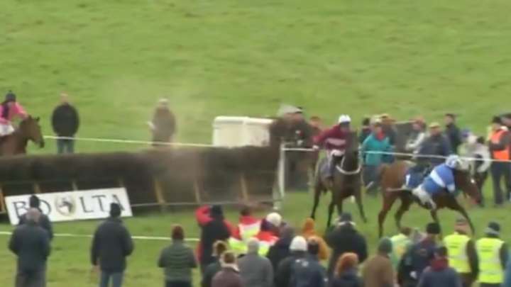 WATCH: Jockey Almost Falls Off Horse, Miraculously Recovers to Win Race
