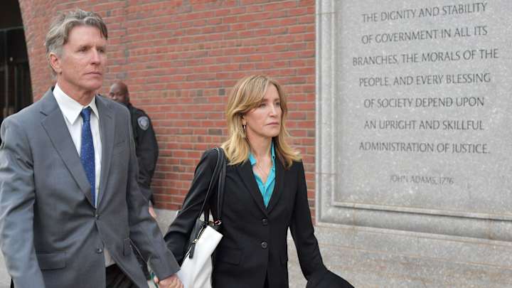 Felicity Huffman, Ex-Texas Tennis Coach Among Defendants to Plead Guilty in Admissions Scandal