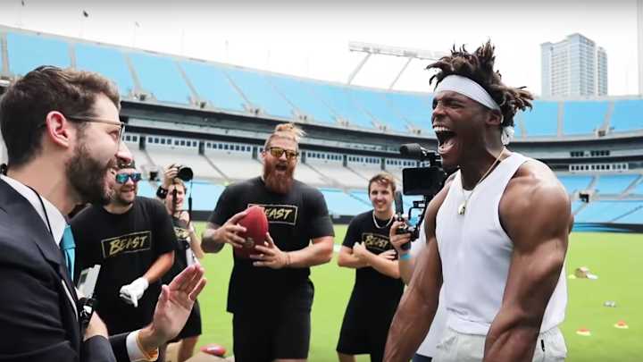 Cam Newton Sets Guinness World Record for One-Handed Catches
