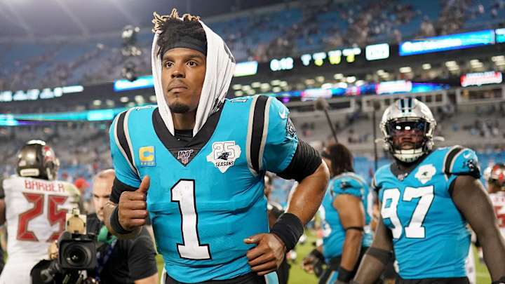 Panthers' Cam Newton Is 'Day to Day' After Reaggravating Foot Injury
