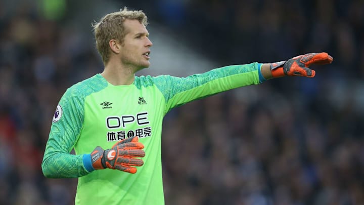 Jonas Lossl Responds to Rumours Linking Him With a Move From Huddersfield to Ligue 1 Giants