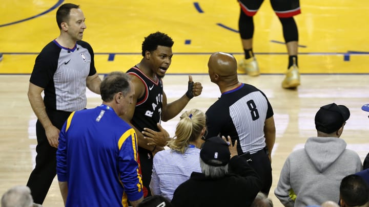 Watch: Kyle Lowry Shoved by Warriors Fan While Diving for Loose Ball