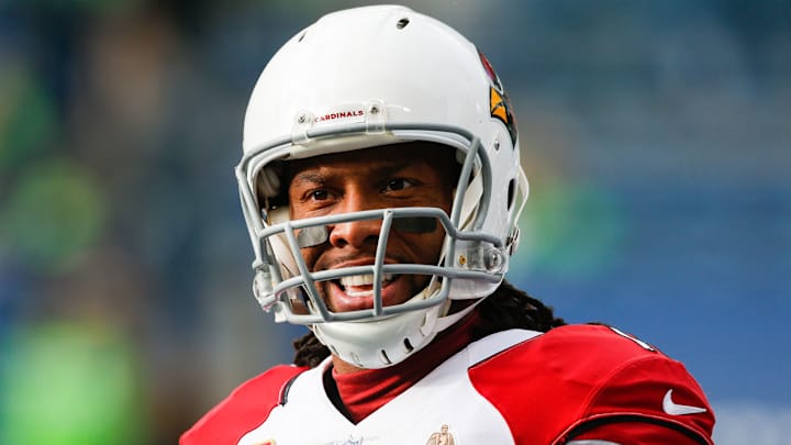 Cardinals' Larry Fitzgerald Sinks Hole-in-One While Golfing with Former President Barack Obama Cardinals' Larry Fitzgerald Sinks Hole-in-One While Golfing with Former President Barack Obama