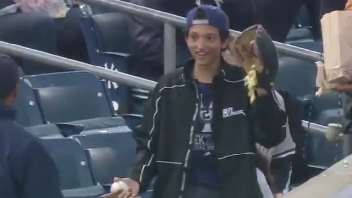 Watch: Young Yankees Fan Catches a Foul Ball With Popcorn In His Glove Watch: Young Yankees Fan Catches a Foul Ball With Popcorn In His Glove