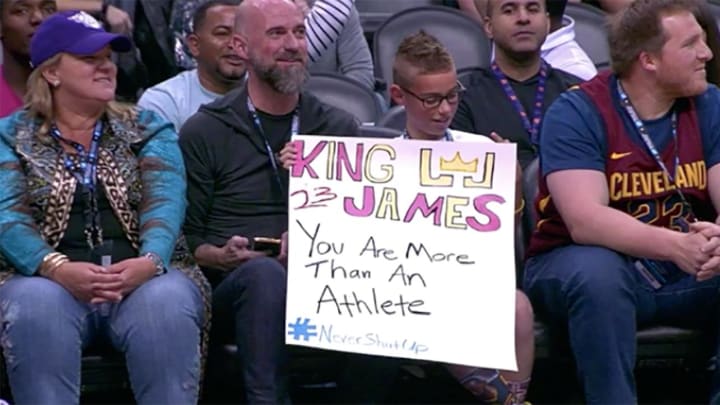 LeBron James Gives Arm Sleeve to Kid Holding ‘You Are More Than an Athlete’ Sign
