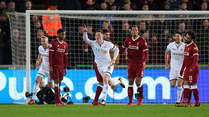 Liverpool Follows Man City Win With Stunning Loss at Last-Place Swansea