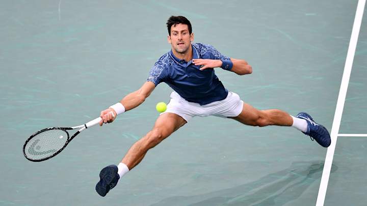 Djokovic, Federer Advance to Paris Quarterfinals