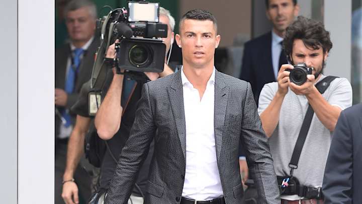 Cristiano Ronaldo Reaches Deal with Spain's Tax Office After Evasion Charges Cristiano Ronaldo Reaches Deal with Spain's Tax Office After Evasion Charges