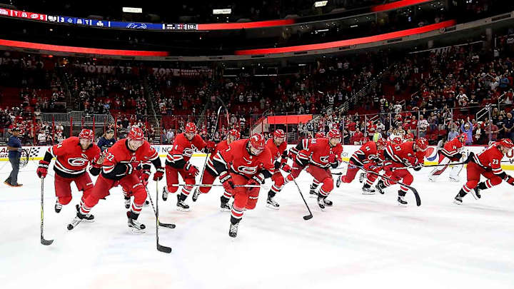 A 'Storm Surge:' Hurricanes Celebrate Wins by Leaping Into Glass