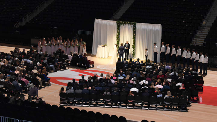 Couple Who Met at Hawks' 'Swipe Right Night' Get Married On Philips Arena Court