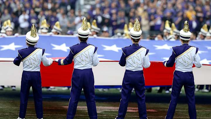 Washington Band Skipping Apple Cup After Bus Rolls Onto Side on Highway Washington Band Skipping Apple Cup After Bus Rolls Onto Side on Highway