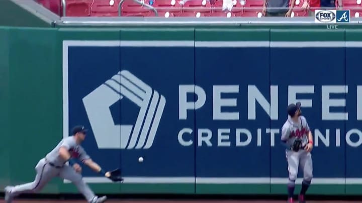 Watch: Braves Outfield Narrowly Misses Alley-Oop Catch on Fly Ball