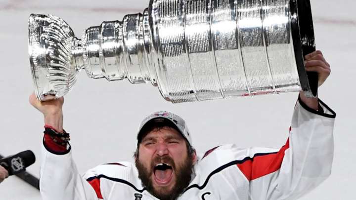 Watch: Capitals' Alex Ovechkin Lifts First Stanley Cup, Passes It to Nicklas Backstrom