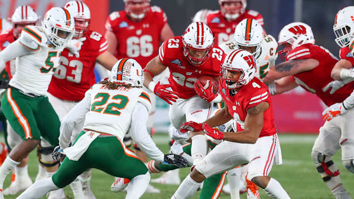 Jonathan Taylor Runs for 205 Yards in Wisconsin's Pinstripe Victory