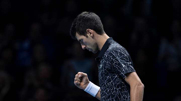 Djokovic Cruises Past Isner in ATP Finals Opener
