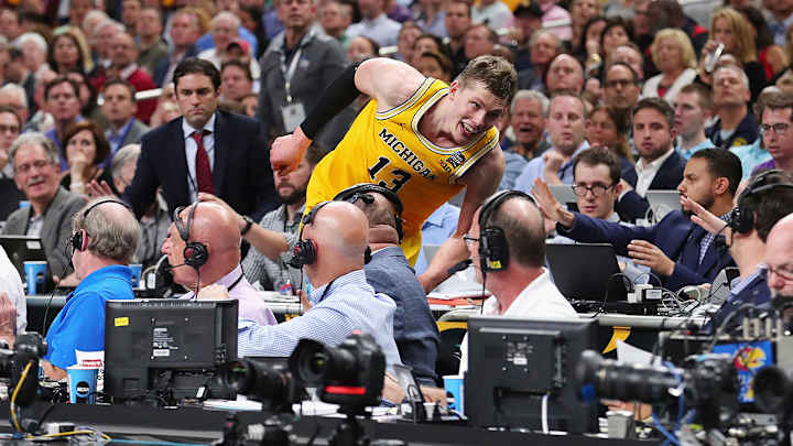 Watch: Mo Wagner Goes Flying Into TBS Crew, Breaks Bill Raftery's Glasses Watch: Mo Wagner Goes Flying Into TBS Crew, Breaks Bill Raftery's Glasses
