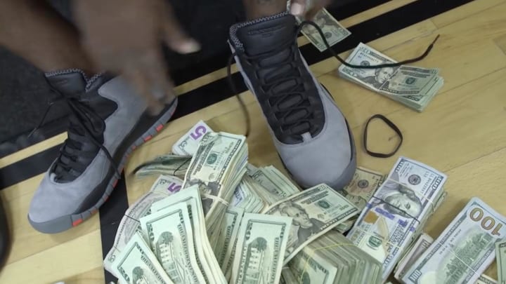 Gilbert Arenas Brings $100,000 in Cash to the Gym for Make-Believe Bet With Nick Young Gilbert Arenas Brings $100,000 in Cash to the Gym for Make-Believe Bet With Nick Young