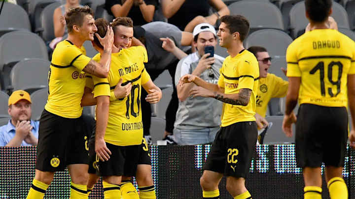 Borussia Dortmund Reportedly Place €70m Price Tag on Young Starlet as Interest Continues to Mount Borussia Dortmund Reportedly Place €70m Price Tag on Young Starlet as Interest Continues to Mount