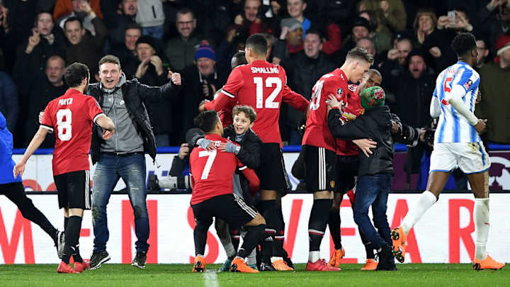 Young Man Utd Fan's Dad in Hot Water After Alexis Sanchez Celebration Against Huddersfield