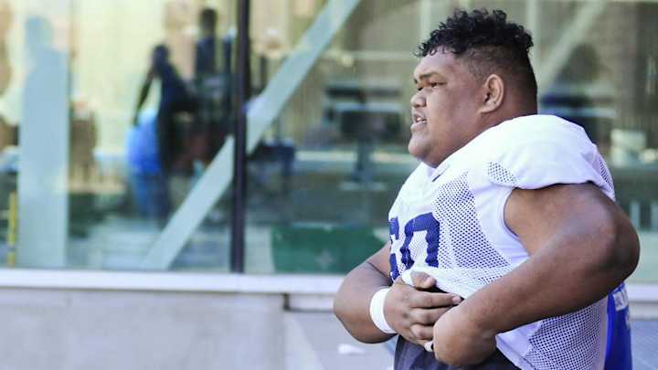 BYU Lineman Gets Stuck in Gymnastics Team Foam Pit