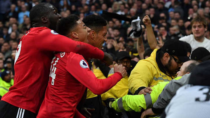 PHOTO: Man City Steward Spotted Laughing As Man Utd Players Celebrate Chris Smalling's Late Winner