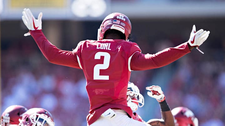 Arkansas Suspends Two Players For Socializing With Opponent's Cheerleaders