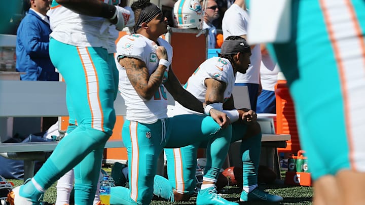 Which NFL Players Protested Racial Injustice During the National Anthem in Week 14?